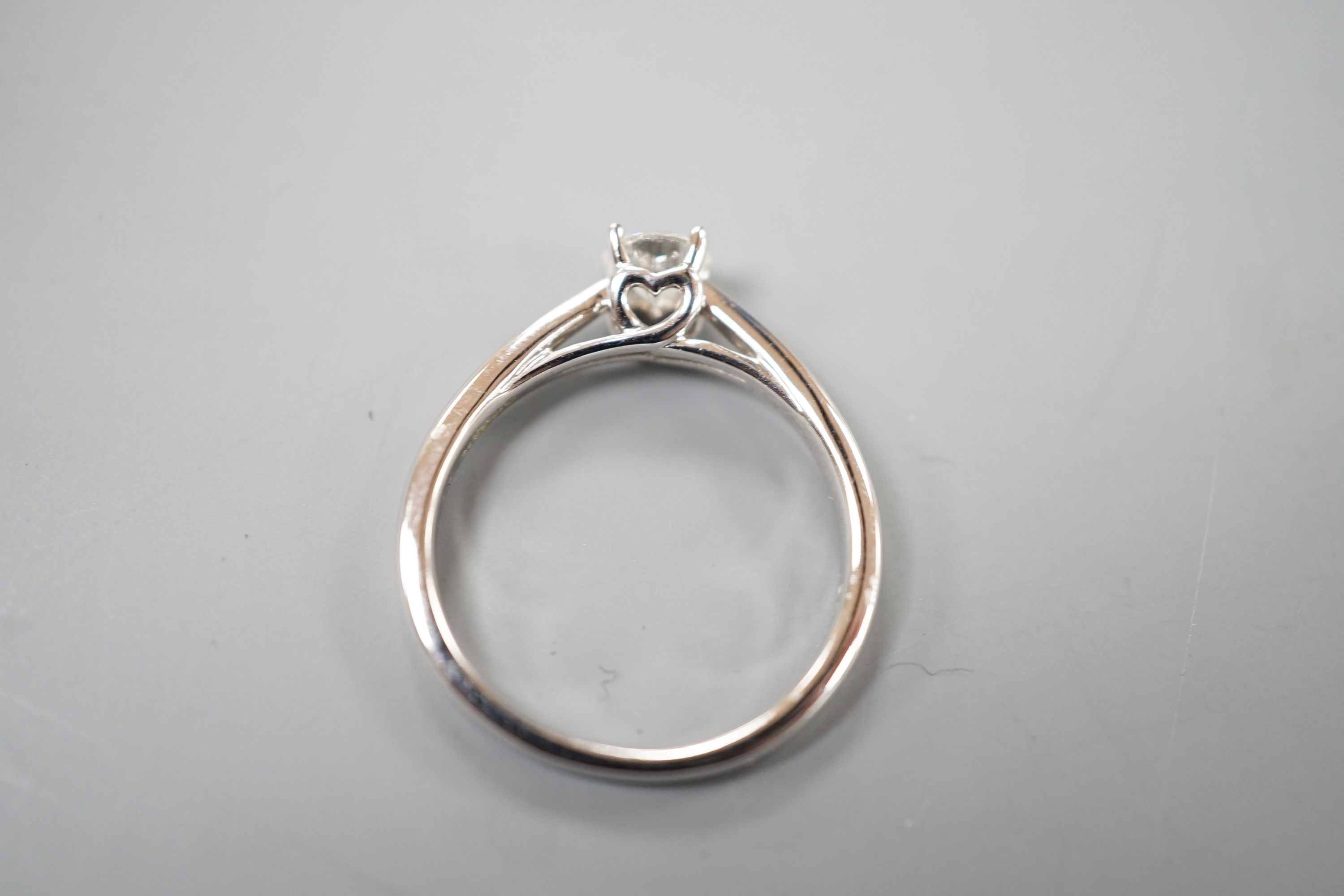 A modern 9k white metal and solitaire diamond ring, the stone weighing 0.33ct, size L, gross weight 2.5 grams.